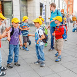 Group of school children in Berlin on an excursion with their teacher