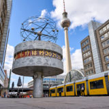 The Urania World Clock in Berlin and TV Tower on Alexander Square