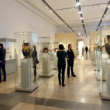Visitors in the Antiquities room of the Altes Museum, one of the five museums in the Museumsinsel complex and a UNESCO World Heritage Site