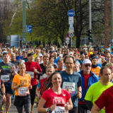 The Berlin Half Marathon. Athletes run on Karl-Liebknecht-Strasse